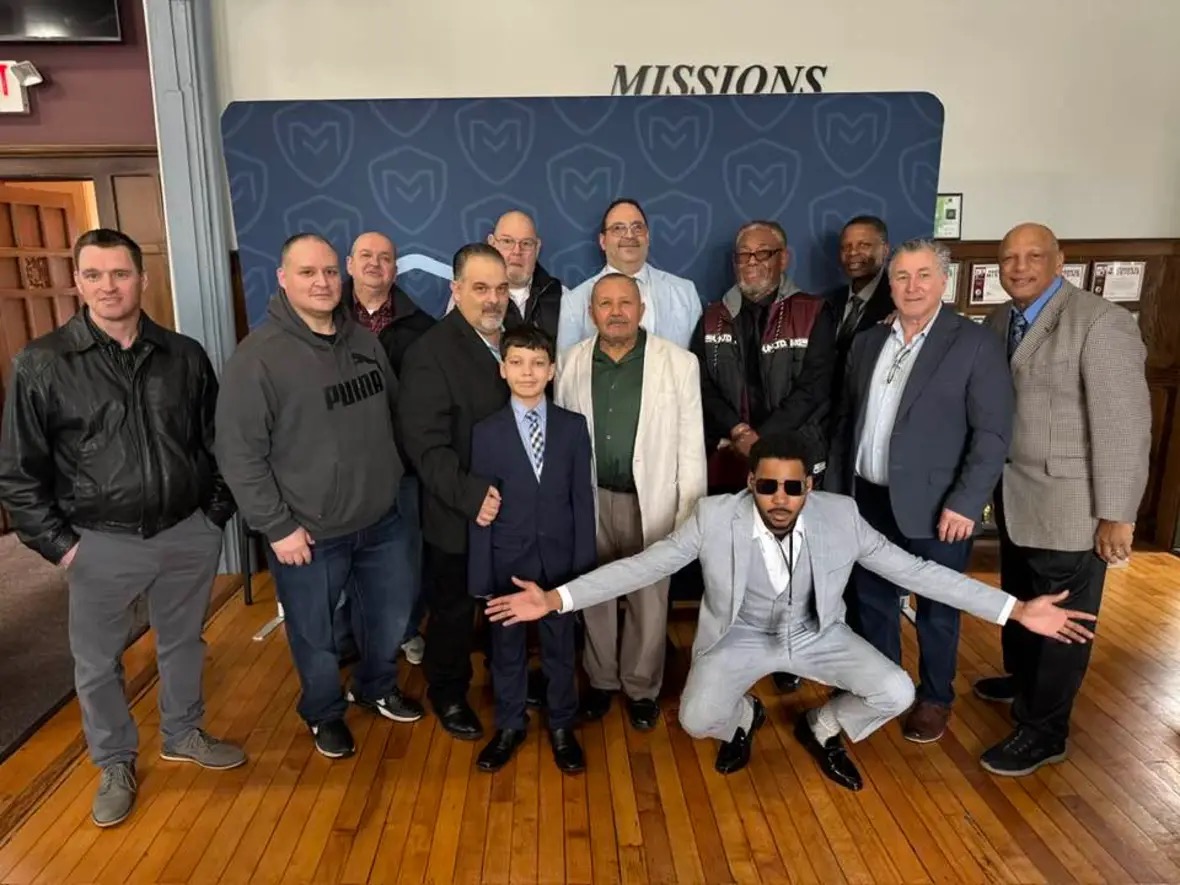 Men gathering at MA-RI event